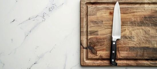 Poster - Knife resting on a cutting board with a white background perfect for adding your own content in the copy space image