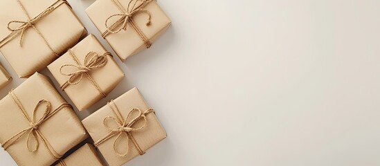 Aufkleber - Elegant paper wrapped vertical gift boxes on a white background with copy space image