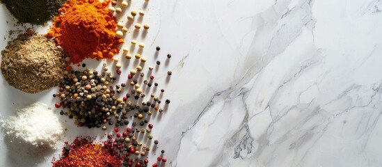Poster - Top view of various spices displayed on a white marble surface with room for text Copy space image