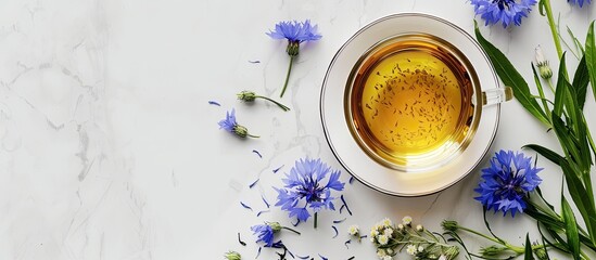 Aufkleber - Notebook featuring a delightful arrangement of fragrant green tea leaves and vibrant cornflowers on a copy space image