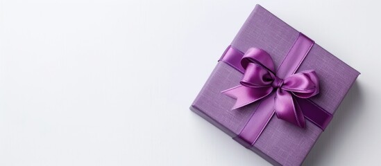 Poster - Gift box in purple with copy space image against white backdrop