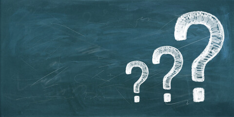 Poster - Chalkboard with three large question marks in white chalk on a green background.