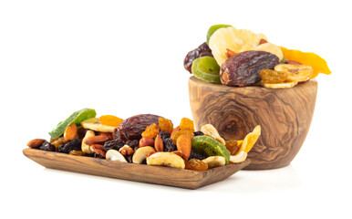 Wall Mural - Dried tropical fruits, nuts, and raisins isolated on white.