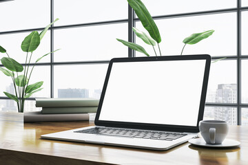 Poster - Modern workspace with a laptop on a wooden desk in front of a large window with city view. 3D Rendering