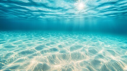 Wall Mural - Sunlight streaming through clear underwater ocean scene.