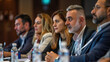 © Chatchanan - Focused discussion among business leaders at a seminar