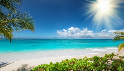 sun shining over a tropical beach with palm trees and turquoise water