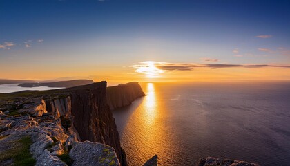 Poster - midnight sun at north cape nordkapp on the northern point of norway and europe with barents sea a part of atlantic ocean