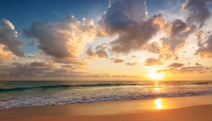 beautiful cloudscape over tropical sea and beach shore sunrise over ocean horizon