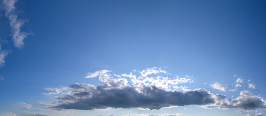 Poster - Real amazing panoramic sunrise or sunset sky with gentle colorful clouds. Long panorama.