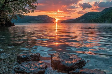 Wall Mural - Sunset Reflected in a Calm Lake with Rocky Shore