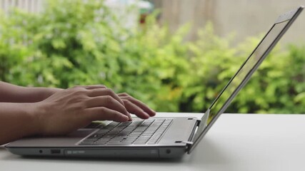 Poster - Close up of freelancer's developer hands typing program code on laptop keyboard in coworking. Businessman at work in working in cafe. Copywriter writing text on computer keyboard in coffee shop.