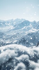 Wall Mural - A snowy mountain range with snow falling on it