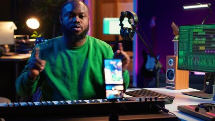 Poster - Artist songwriter hosting online master class to teach piano lessons on internet vlog, electronic keyboard notes in home studio. Young composer playing on synthesizer, recording video. Camera A.