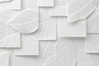 © SHOTPRIME STUDIO - Leaves pattern on white wall creating geometric shapes for home decor and interior design