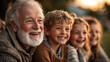 © Seasonal Wilderness - Grandparents Laughing with Their Grandchildren Outdoors at Sunset