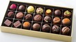 © Duangjai - 26. A collection of artisanal chocolates arranged in an elegant box
