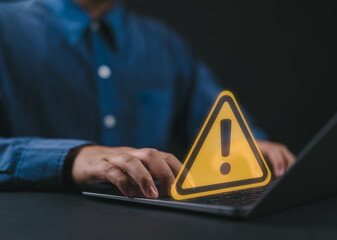 Poster - User or developer working on laptop computer with triangle caution warning sign for notification error and maintenance concept, computer virus detected, personal data protection, network security.