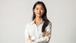© malik - Smiling confident calm millennial business woman, teacher in formal wear with crossed arms, isolated on gray background studio background.