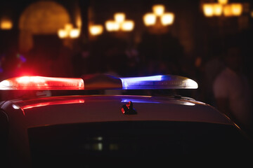 Police car in the city at night.