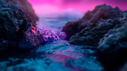 Wall Mural -  A tight shot of rocks nestled by a body of water, framed by a purple-blue sky in the distance, and a pink-purple hued sky above