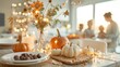 © ngstock - A cozy dining room with a scarecrow centerpiece, a bowl of chocolates, and a family creating Halloween patterns