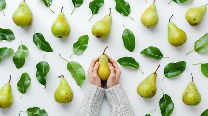 Poster -   A person holds a pear against a backdrop of green-leafed pears on a white background