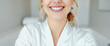 © Rysak - Close-up of a woman smiling with perfect white teeth
