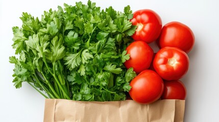 Wall Mural - Fresh tomatoes parsley in paper bag on white background