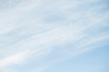milky sky with clouds resembling mist. soft heaven texture of the sky. hazy, foglike clouds providin