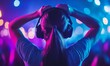 © cosmosgod - Energetic Female DJ Ignites Crowded Nightclub with Vibrant EDM Performance. Unforgettable Dance Experience Unleashes Young Crowd's Energy. Dynamic Nightlife Scene Captures Stress Release and Diverse E
