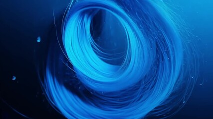 Poster - Vibrant blue fur moving gracefully underwater, creating a mesmerizing swirl, symbolizing tranquility and elegance.