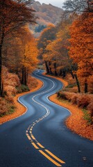 Poster - A winding road with trees on both sides and leaves on the ground