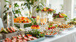 © Burak - Luxury Snack table ready for event. Food and drink catering. Festively decorated beautiful big table full of food ready for guests.Horizontal color photography.
