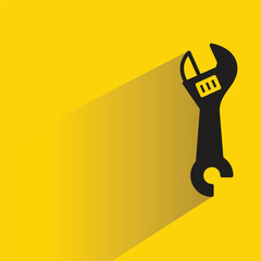 Wall Mural - wrench icon with shadow on yellow background