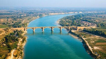 aerial view of newly constructed bridge connecting two countries highlighting connectivity and trade