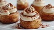 © Boraryn - Close-up of Delicious Cinnamon Rolls with Cream Cheese Frosting