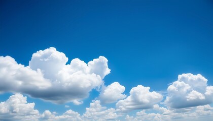 Wall Mural - white fluffy clouds on blue sky in summer