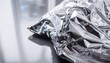 © Josue - aluminum foil for wrapping sandwich glossy crumpled aluminium sheet copy space