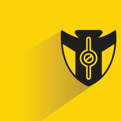 Wall Mural - shield badge with shadow on yellow background