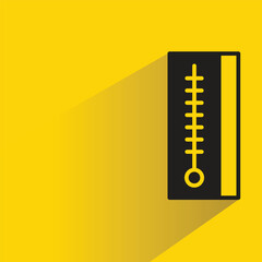 Sticker - thermometer icon with shadow on yellow background