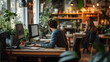 © EleganceStuDesigns - A man working on a computer in a lush, plant-filled modern office. The environment is cozy and creative, with natural light streaming through large windows, highlighting focus and productivity.