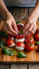 Canvas Print - A person cutting tomatoes with a knife on top of some leaves, AI