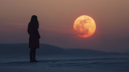 Wall Mural - Woman Stands on Beach Watching Sunset Over Ocean Horizon