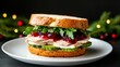 © fotogurme - Pickle bun sandwich with turkey, avocado, and cranberry sauce, perfect for a festive meal