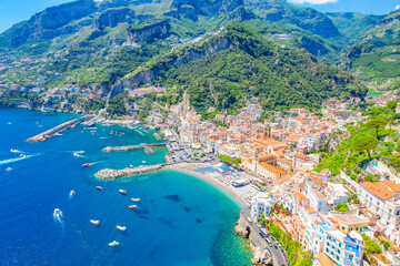 Wall Mural - Amalfi on Amalfi Coast, Italy. Aerial photo of famous city Amalfi located on Amalfi Coast with blue sea water and beautiful colorful houses on the cliff