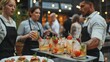 © sambath - Waitstaff in aprons, delivering drinks and appetizers to guests at an event.