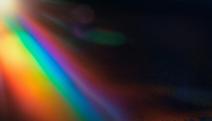 Abstract Light Refraction on Black Background. Spectrum of Rainbow Colors Blurred by Lens Flare, Featuring Vibrant Red, Orange, Green, and Blue Hues in a Soft, Ethereal Glow