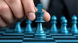 © weerasak - A hand moves a blue chess piece on a modern chessboard, symbolizing strategy, intelligence, and competition in a game.