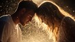 © Maximages  - A tender moment captured between a couple as they touch foreheads, surrounded by a gentle spray of water droplets, symbolizing closeness and connection in a beautiful, serene setting.